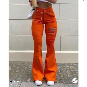 Fashion Nova ripped Flare/wide leg Jeans